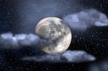 moon and clouds during night time thumbnail