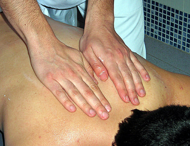 person massaging man's back thumbnail