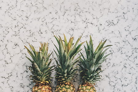 three pineapple fruits thumbnail