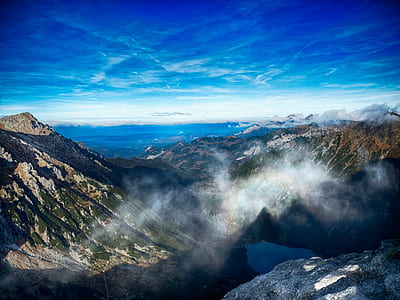 mountain covered by fog thumbnail