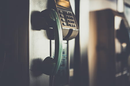 Selective Focus Photo of Green Telephone thumbnail
