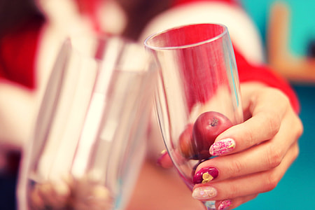 person holding  wine glasses thumbnail