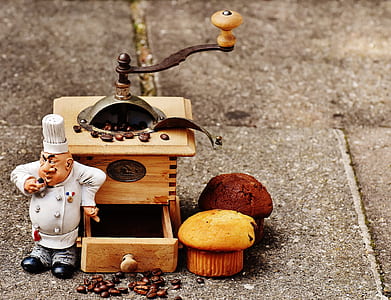 figurine chef standing beside oven miniature thumbnail