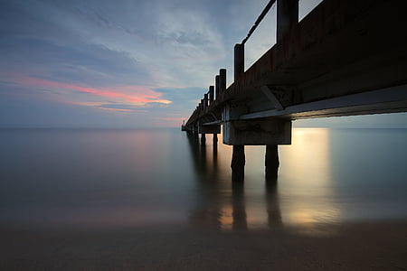 gray wooden dock under body of water thumbnail