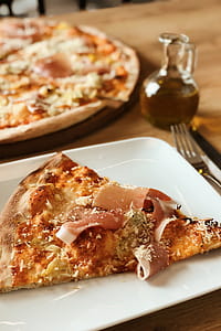 Pizza with Prosciutto on the white plate thumbnail