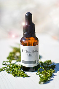 Essential oil, wooden table, essential oils, bottle, glass, aromatherapy thumbnail