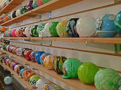 assorted-color plastic toy lot on shelves thumbnail