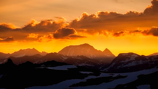 landscape photography of mountains during sunrise thumbnail