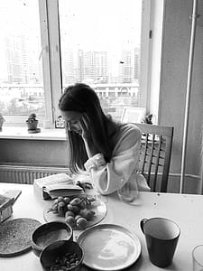 Grayscale Photography of Woman Reading Book thumbnail