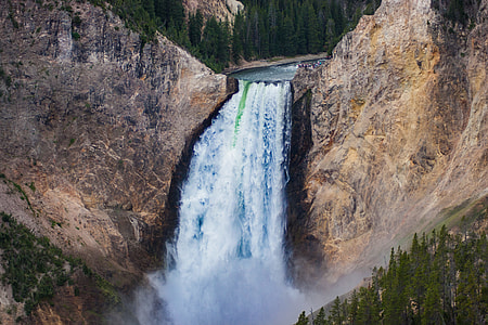 waterfall streaming down during daytime thumbnail