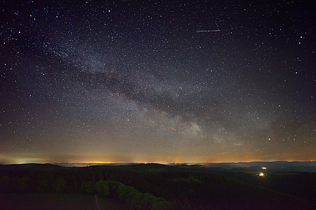 landscape photography of mountains with milky way thumbnail