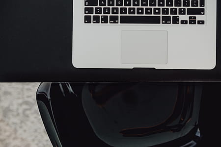 Stylish workspace with MacBook computer on home or studio thumbnail