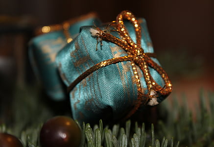 selective photography of green gift box thumbnail