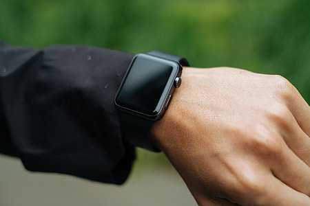 person wearing space gray aluminum case Apple watc thumbnail