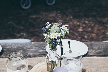 white petaled flower arrangement thumbnail