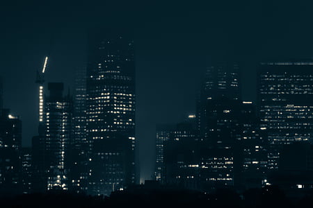 lighted high-rise building during nightime thumbnail