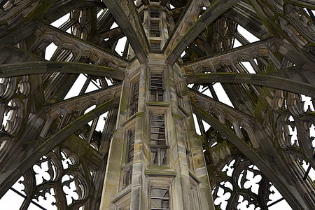 low angle photo of brown wooden tower during daytime thumbnail