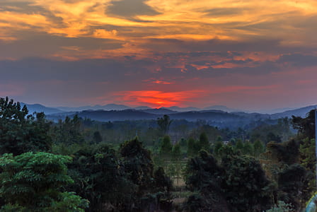Scenic View of Mountains During Sunset thumbnail