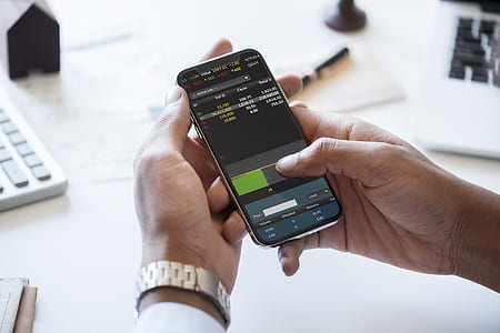 person using smartphone in front of table thumbnail