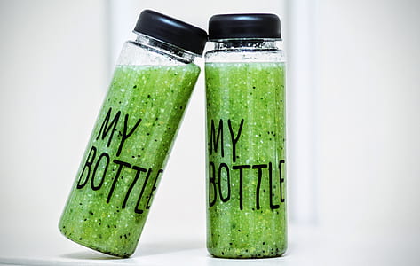 two clear glass bottles thumbnail