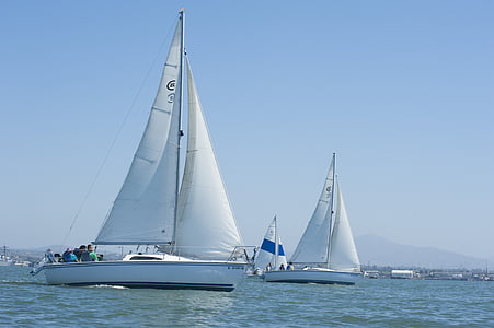 white speedboats on body of water thumbnail