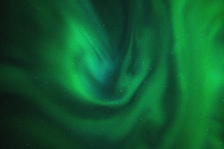 photo of green aurora during nighttime thumbnail