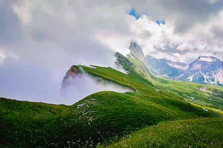 mountain peak surrounded by clouds thumbnail
