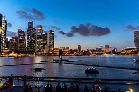 body of water near cityscape thumbnail