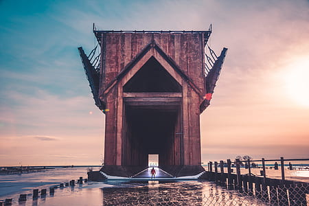 man standing in front of the bridge thumbnail