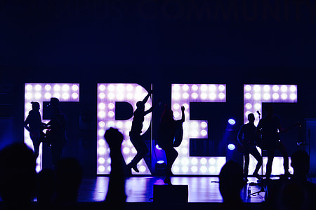 group of people playing music on stage thumbnail