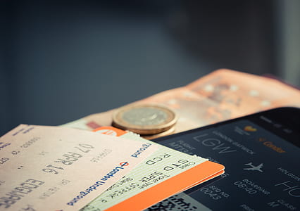 ticket cards and coin on focus photo thumbnail