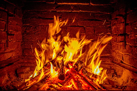 woods flaming inside fireplace thumbnail