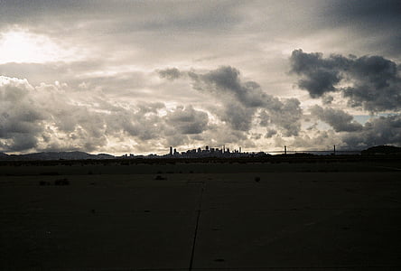 white concrete ground under white clouds thumbnail