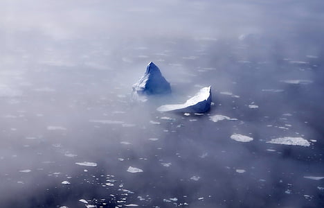 ice berg surrounded with fogs thumbnail