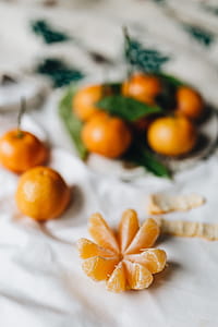 Still life of mandarin oranges with leaves thumbnail