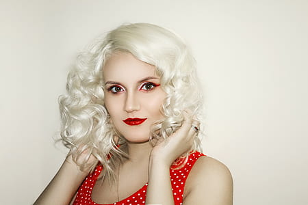 woman holding her hair thumbnail
