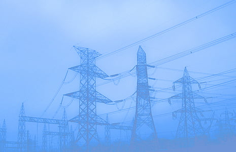 black steel electric posts during fog thumbnail