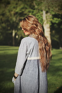 photo of woman wearing gray striped long-sleeved dress thumbnail