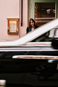 girl standing near doorstep thumbnail