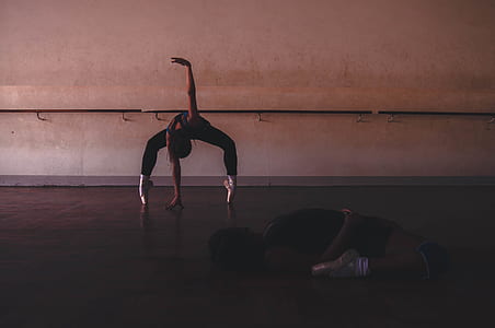 two ballerina dancing on brown painted hall thumbnail