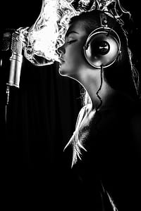 woman smoking in front of studio microphone thumbnail