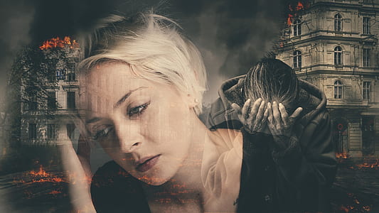 woman looking away at destroyed building thumbnail
