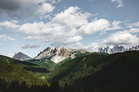 white and green mountain under blue sky at daytime thumbnail