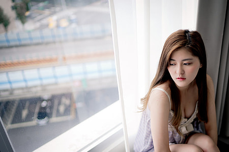 woman wearing gray spaghetti strap top thumbnail