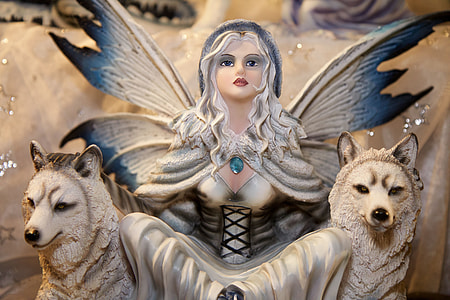 female fairy with two wolves figurine thumbnail
