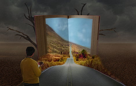 man standing on gray concrete road leading to book thumbnail