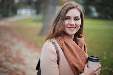 Woman Holding Disposable Cup thumbnail