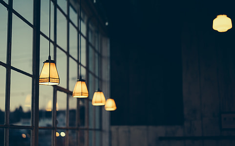 lightened pendant lamps inside room thumbnail