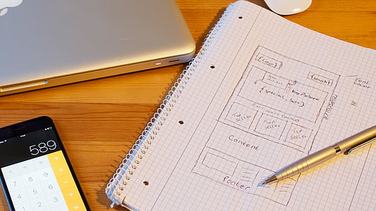 grid paper near turned on smartphone thumbnail