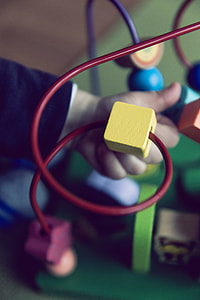 multicolored cube maze toy macro photography thumbnail
